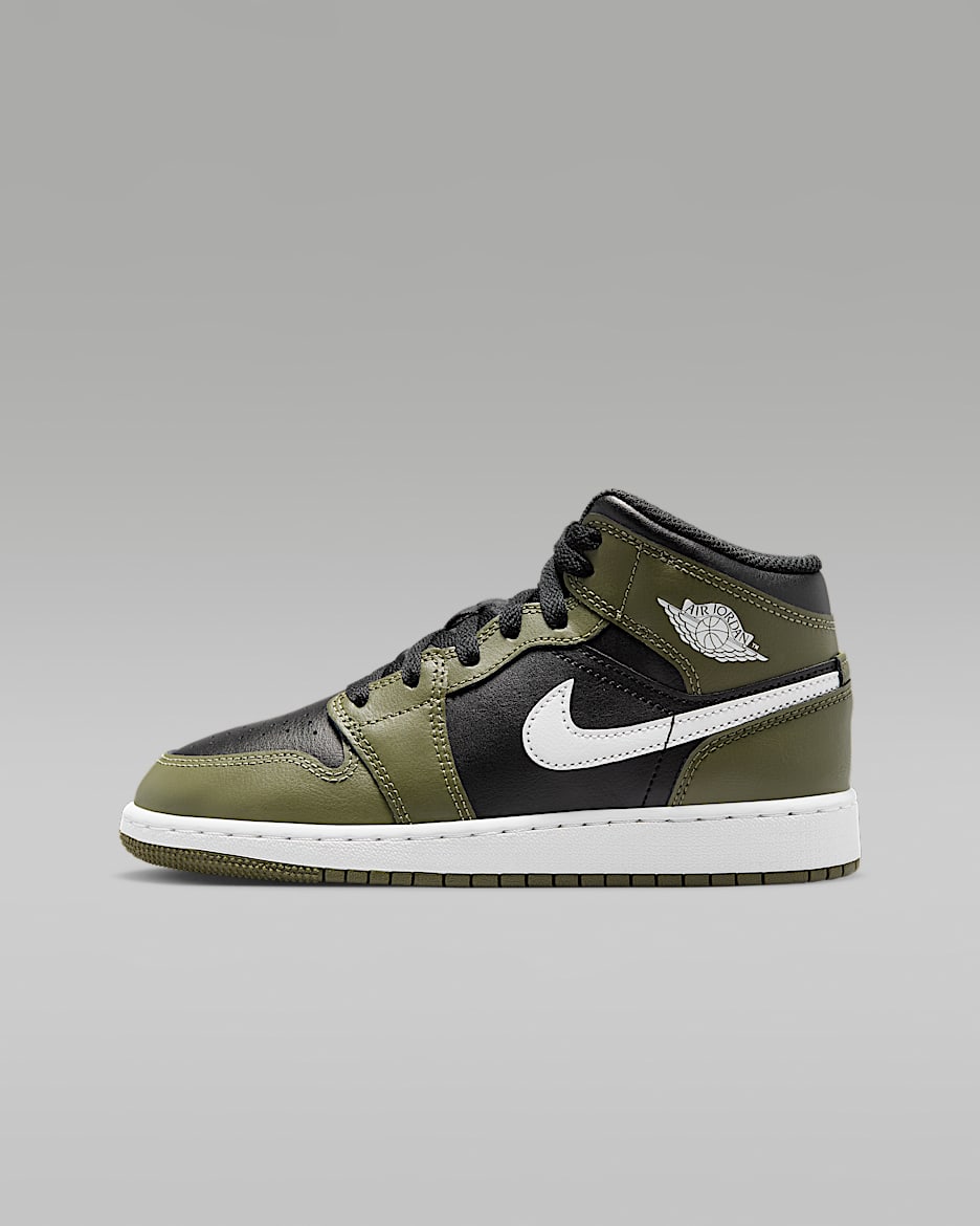 Air Jordan 1 Mid Big Kids Shoes. Nike